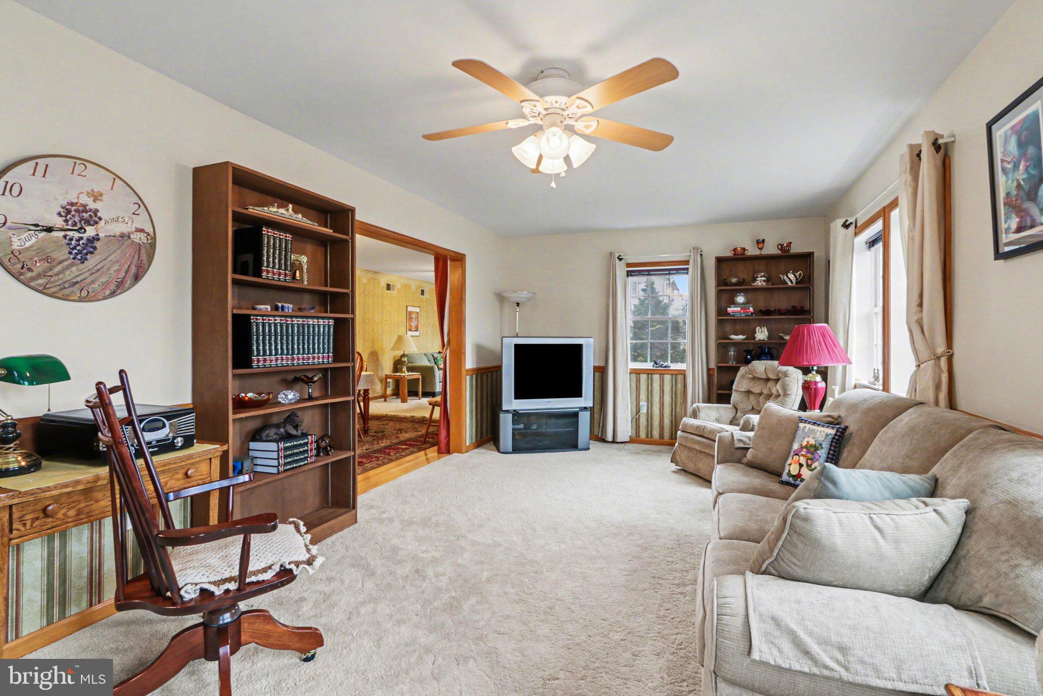 467 Beech Tree Street Shippensburg, PA 17257 - Photo 15 of 54 a living room with furniture and a flat screen tv