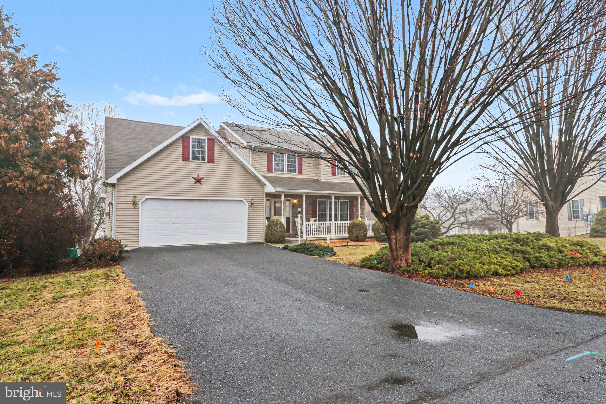 467 Beech Tree Street Shippensburg, PA 17257 - Photo 41 of 54 a front view of a house with a yard and garage
