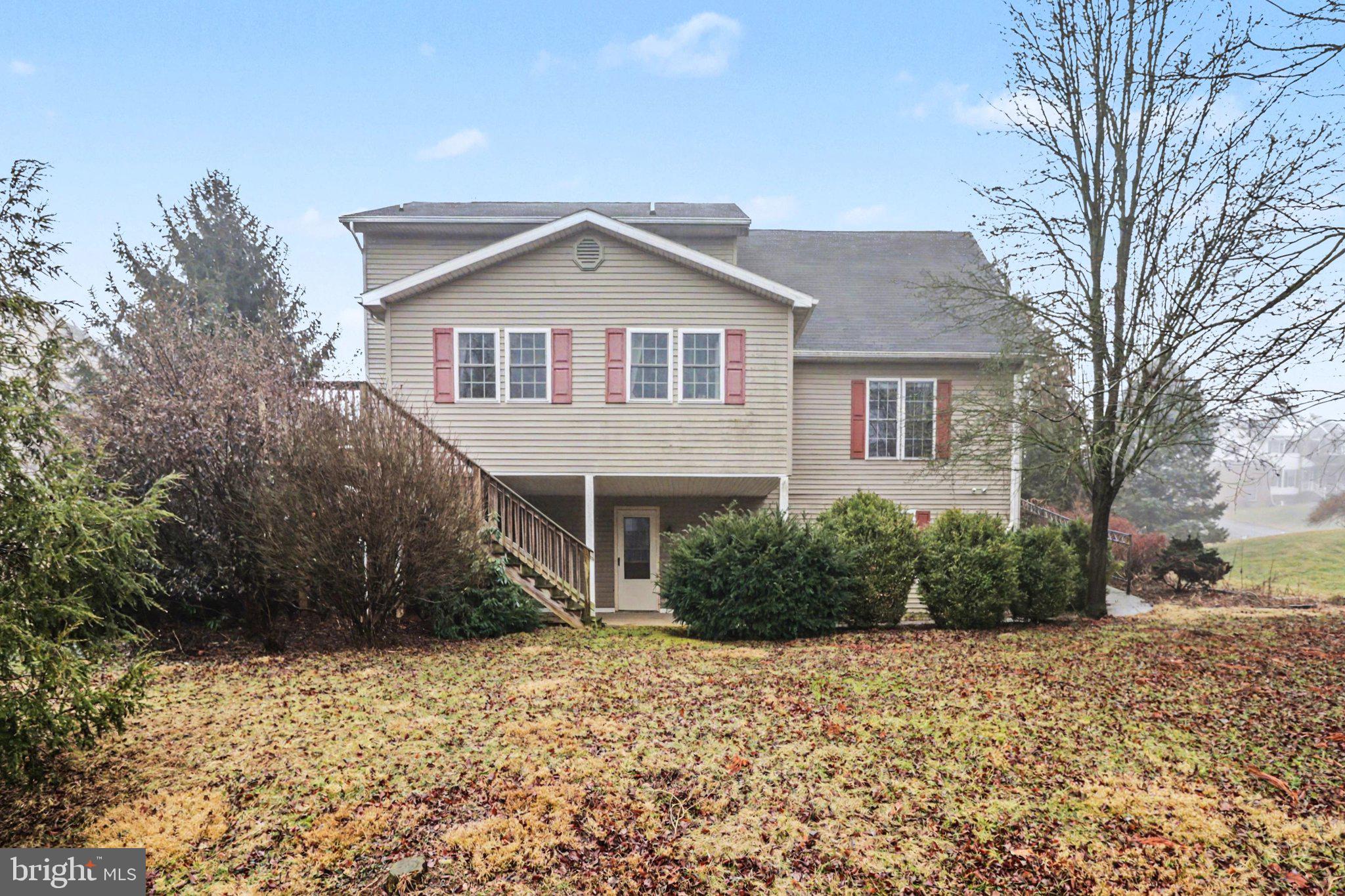 467 Beech Tree Street Shippensburg, PA 17257 - Photo 42 of 54 a front view of a house with a yard