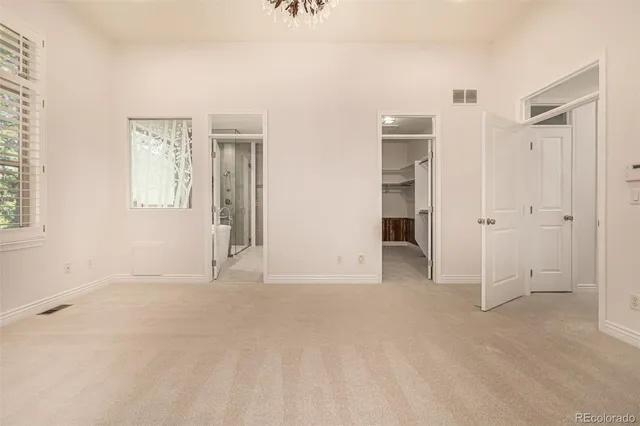 a bathroom with a double vanity sink mirror double and shower