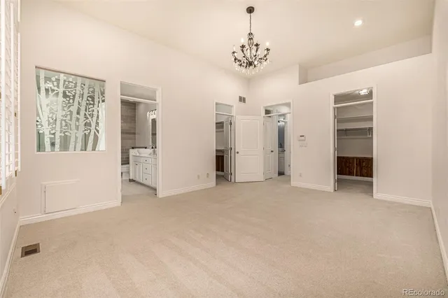 a white bath tub sitting next to a white toilet