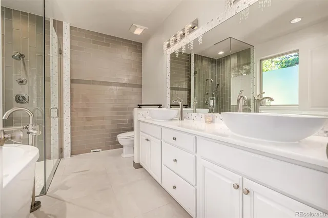 a white bath tub sitting in a bathroom
