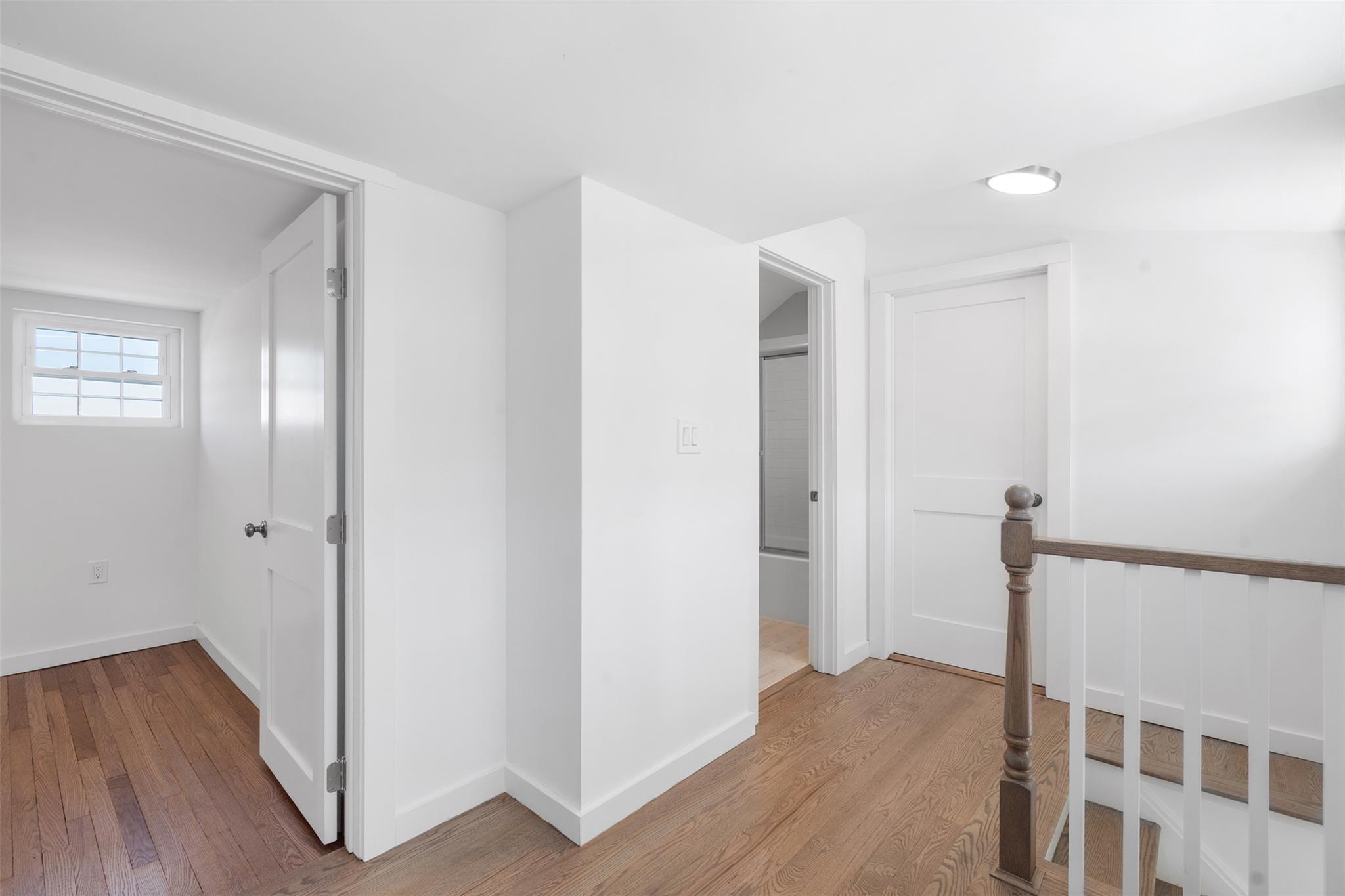 70 Barmore Road LaGrangeville, NY 12540 - Photo 21 of 47 Corridor with light wood-type flooring and an upstairs landing