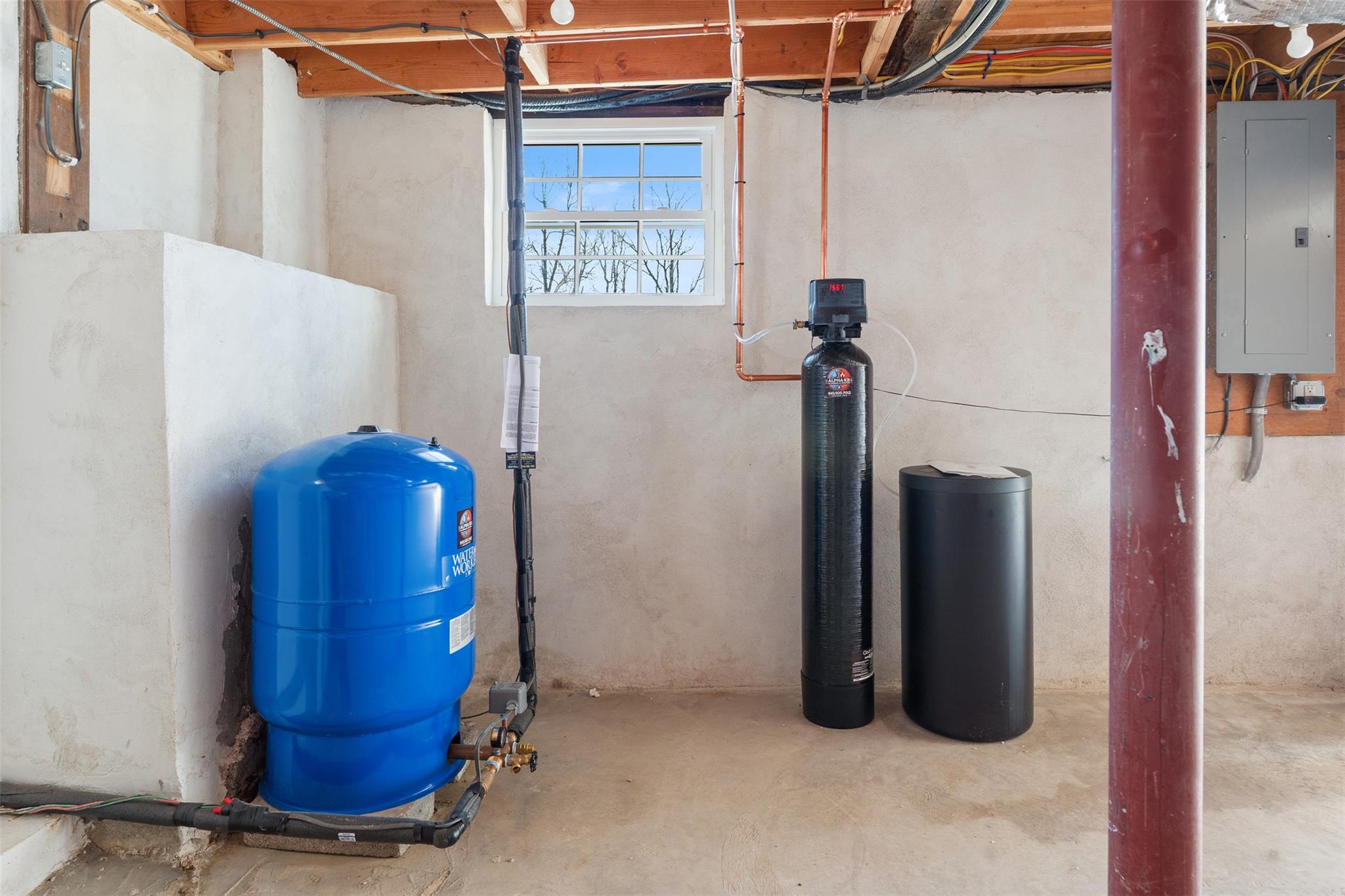 70 Barmore Road LaGrangeville, NY 12540 - Photo 30 of 47 Below grade area featuring electric panel, a water pressure tank, and a water softener