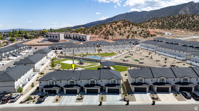 668 East Fiddlers Canyon Road, Unit 6 Cedar City, UT 84721 - Photo 32 of 36 Modern townhome community featuring a playground and green space