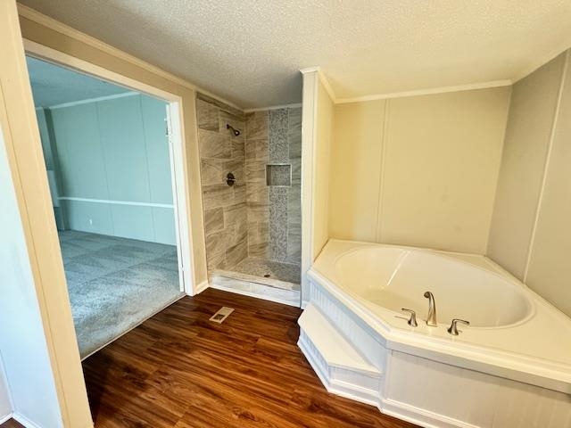 281 Pintail Circle Drummonds, TN 38023 - Photo 19 of 26 a bathroom with a bathtub and shower