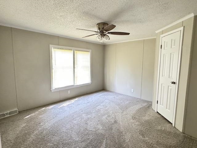 281 Pintail Circle Drummonds, TN 38023 - Photo 20 of 26 an empty room with windows and fan