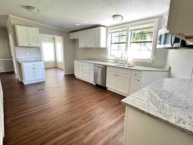 281 Pintail Circle Drummonds, TN 38023 - Photo 5 of 26 a kitchen with granite countertop wooden floors and white appliances