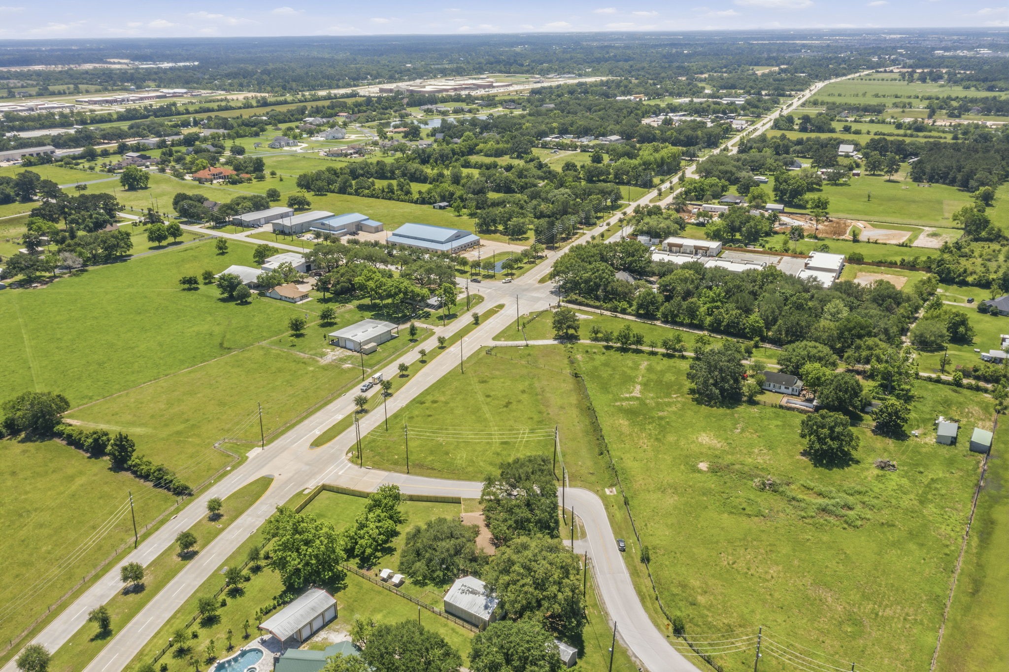 0 Mueschke Road Tomball, TX 77377 - Photo 41 of 44 an aerial view of residential houses with outdoor space and swimming pool