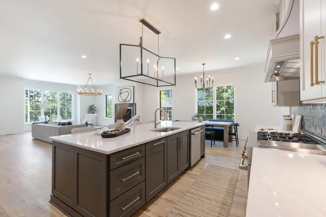 a kitchen with cabinets and window