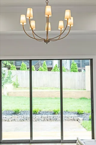 a white bath tub sitting in a en suite bathroom