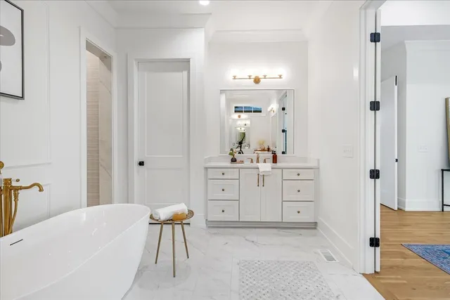 a view of a kitchen with stairs and a window