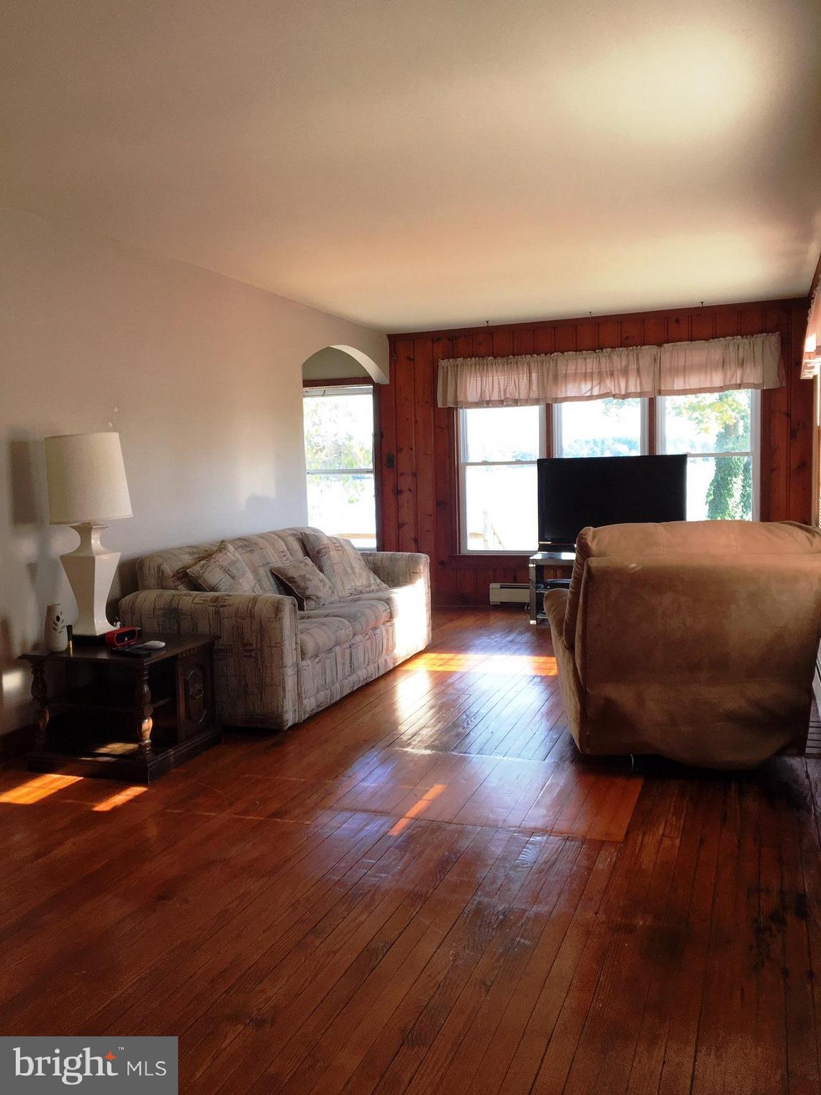 101 Shoals Road Crumpton, MD 21628 - Photo 11 of 34 Living room with hardwood floors