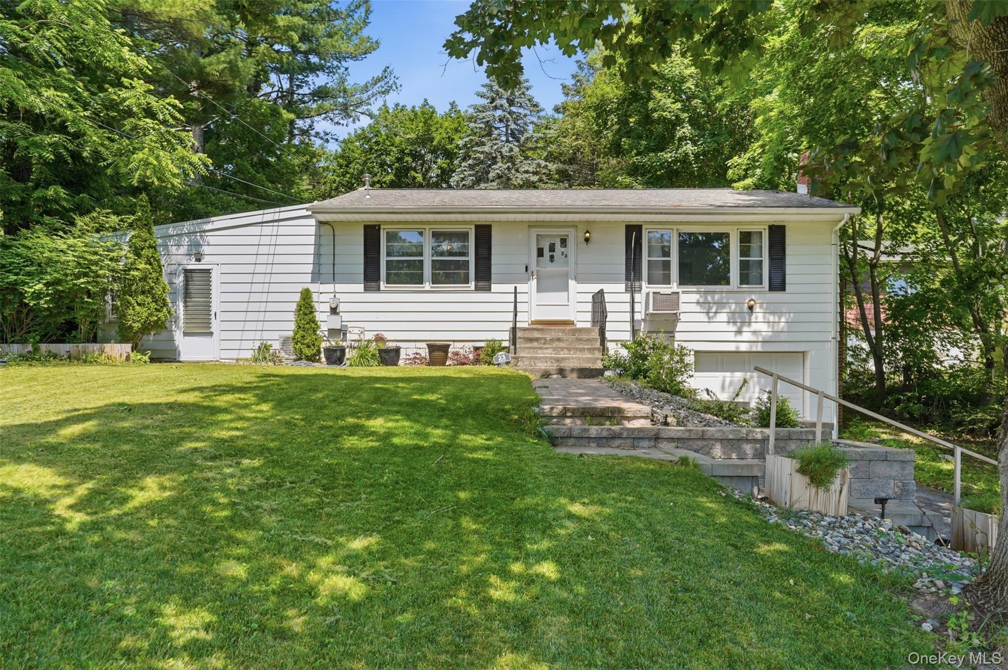 23 Dupay Road Pleasant Valley, NY 12569 - Photo 1 of 24 Split-level residence featuring white siding, dark shutters, and a prominent front entrance with stone steps