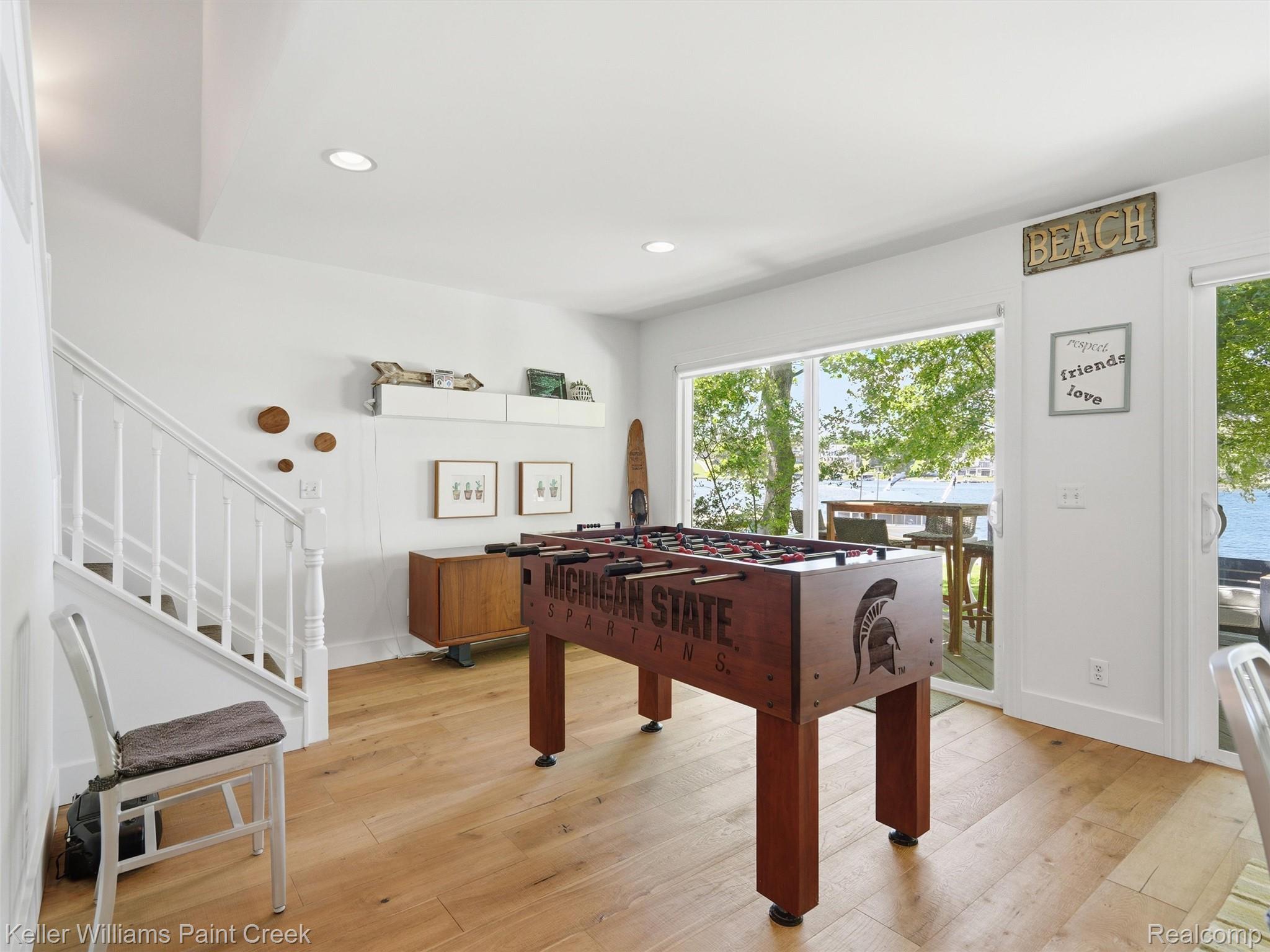 10435 Spring Street Fenton, MI 48430 - Photo 20 of 40 Room featuring light wood-finish flooring, white walls, and recessed lighting