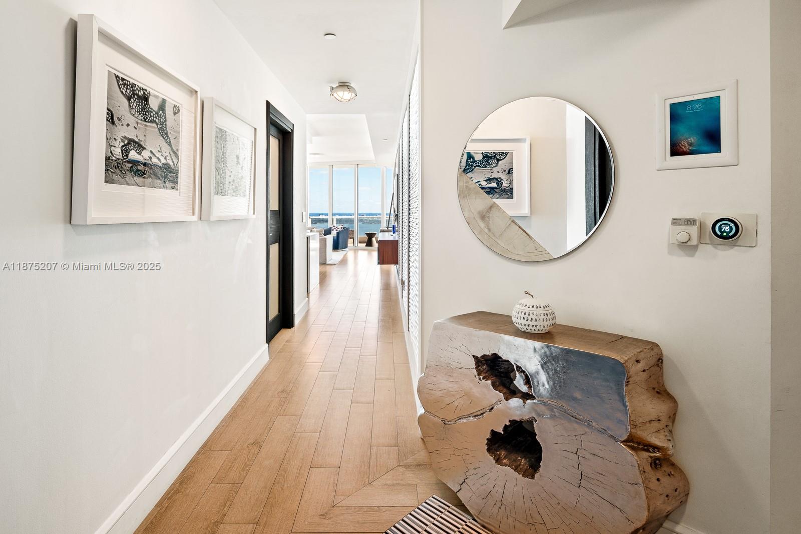 2020 North Bayshore Drive, Unit 4101 Miami, FL 33137 - Photo 13 of 23 a bathroom with a sink and mirror