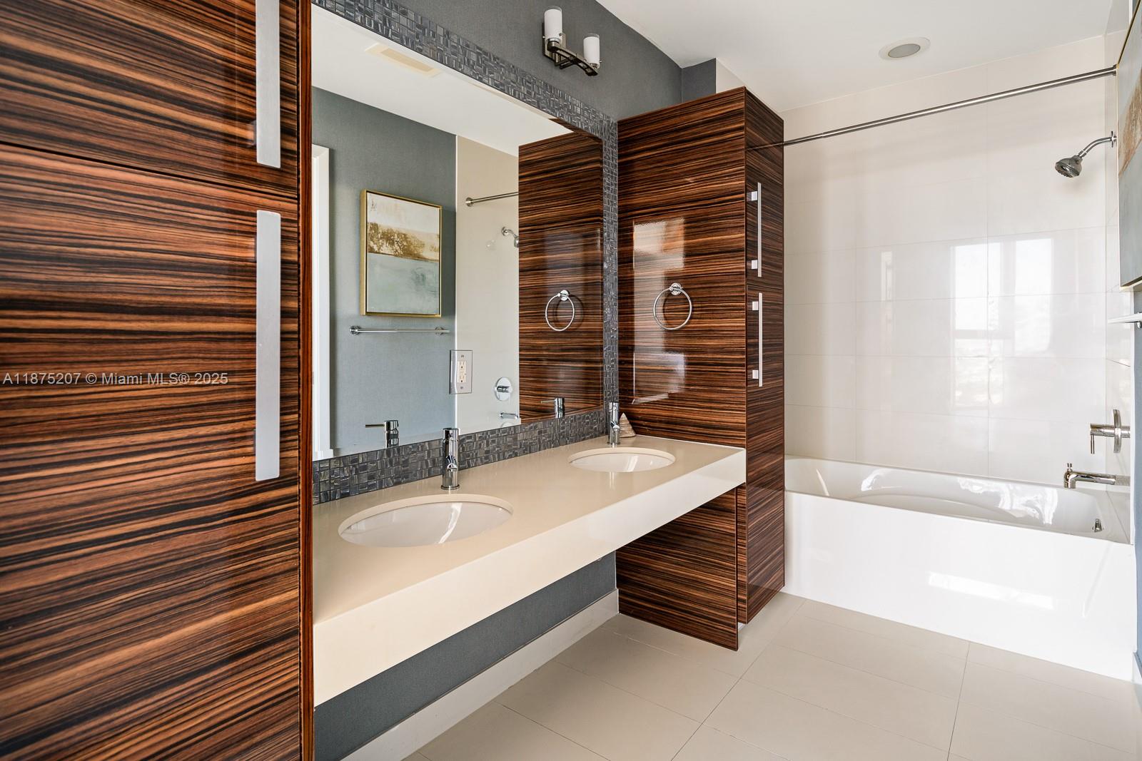 2020 North Bayshore Drive, Unit 4101 Miami, FL 33137 - Photo 21 of 23 a bathroom with a sink and a bathtub