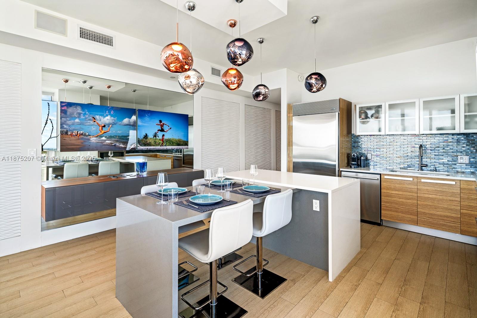 2020 North Bayshore Drive, Unit 4101 Miami, FL 33137 - Photo 7 of 23 a kitchen with stainless steel appliances granite countertop a sink and cabinets