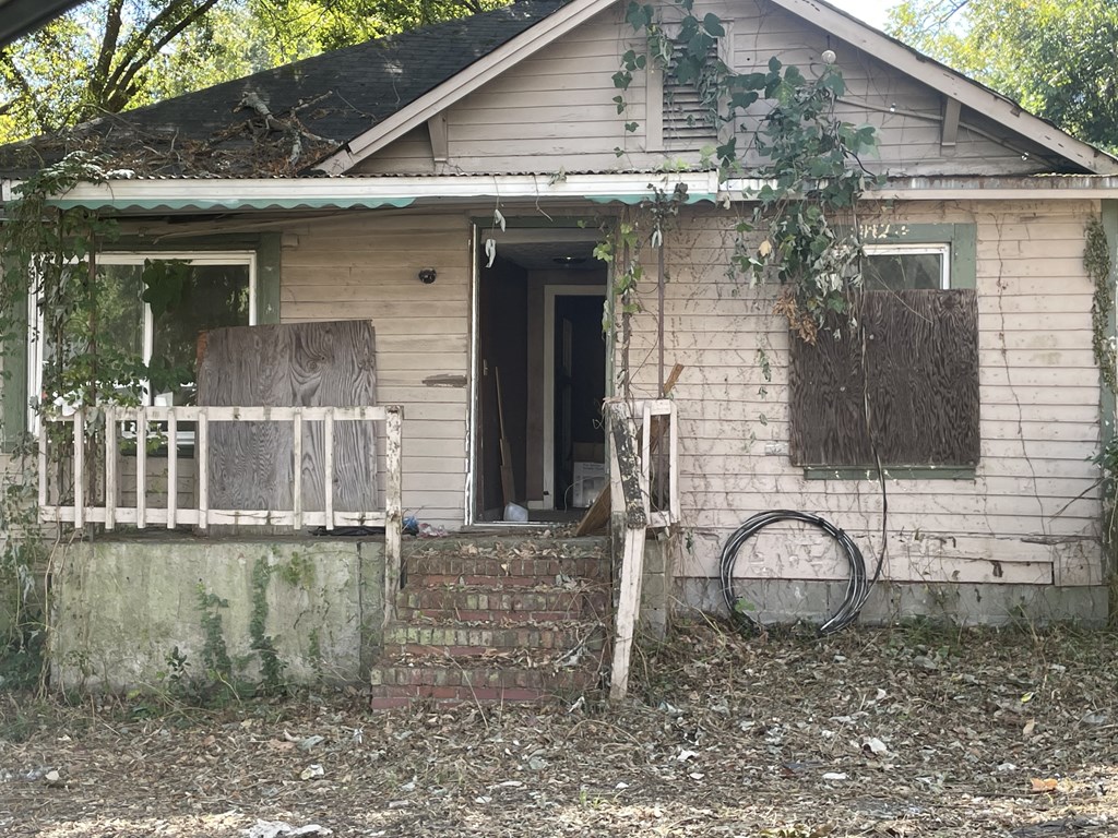 2114 George Street Columbus, GA 31906 - Photo 2 of 2 a front view of a house with a yard