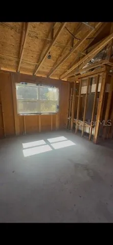 a view of empty room with an empty room