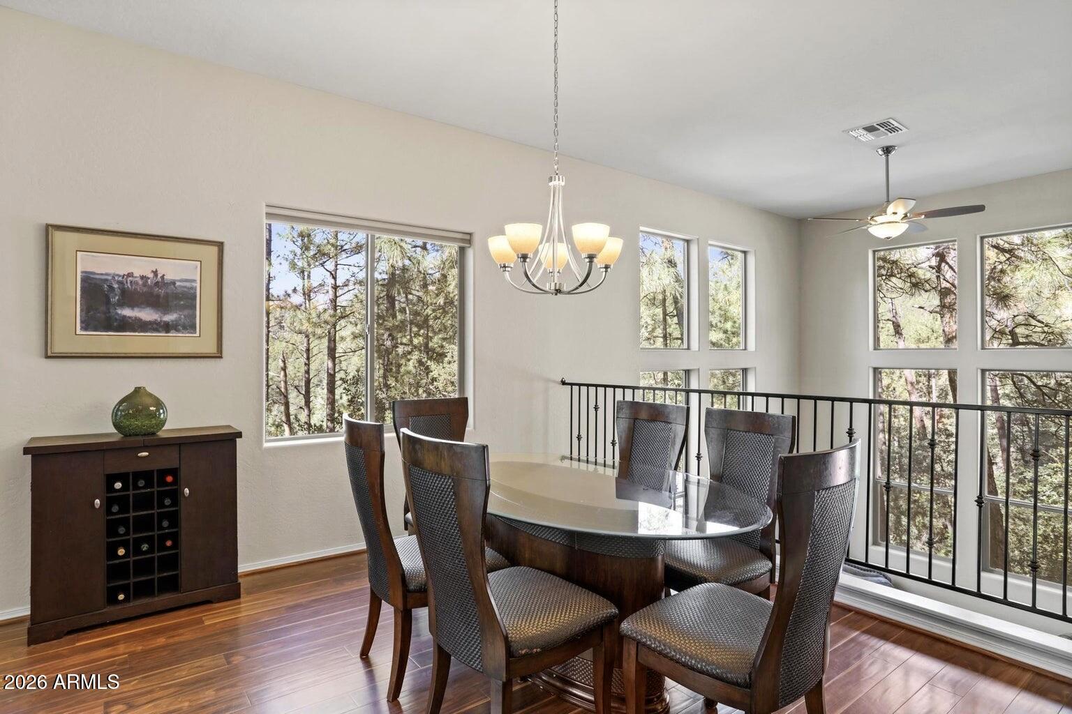 415 East Rim Estates Trail Payson, AZ 85541 - Photo 17 of 76 a view of a dining room with furniture window and wooden floor