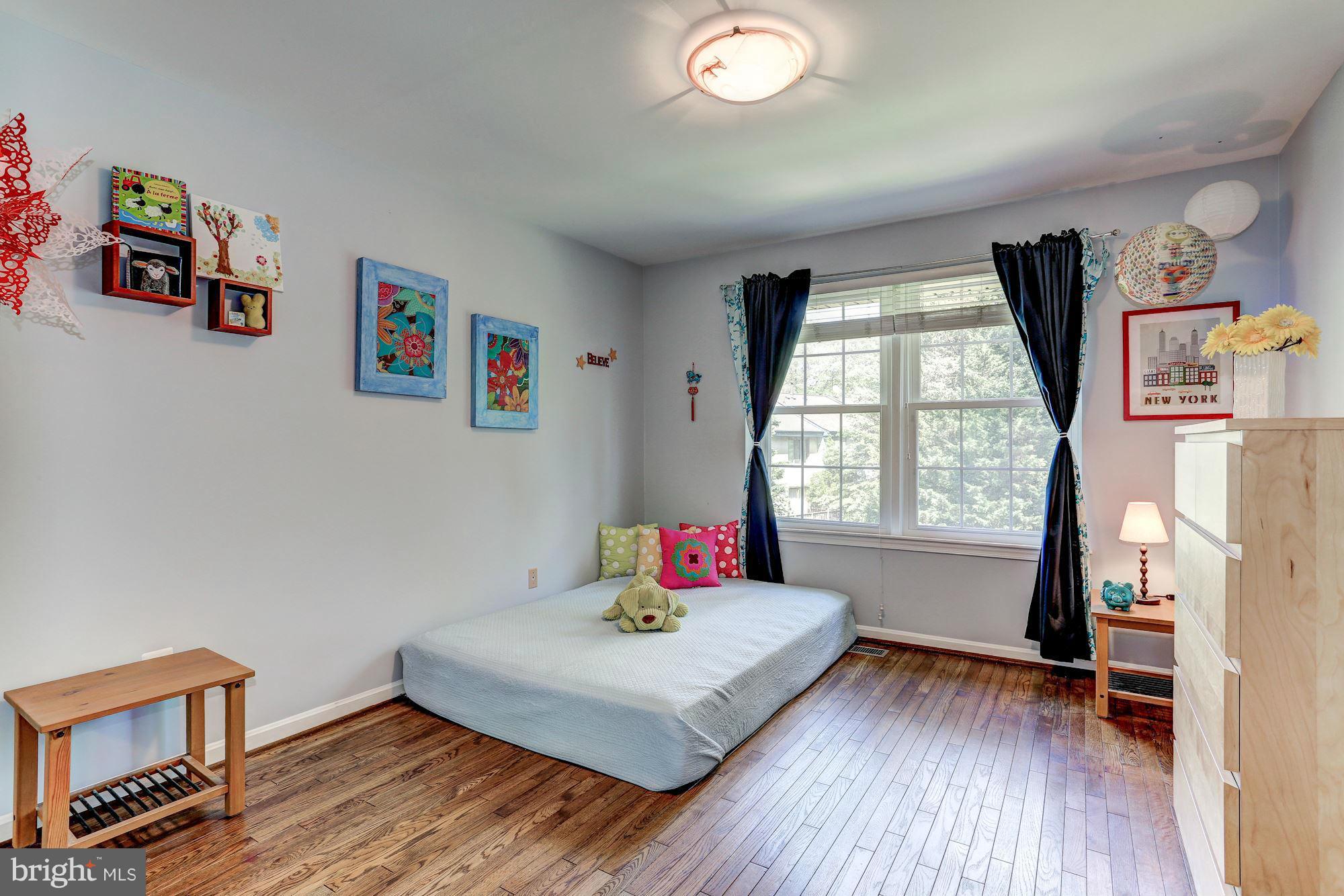2109 Golf Course Drive Reston, VA 20191 - Photo 14 of 30 2nd bedroom w/hardwoods backs to trees