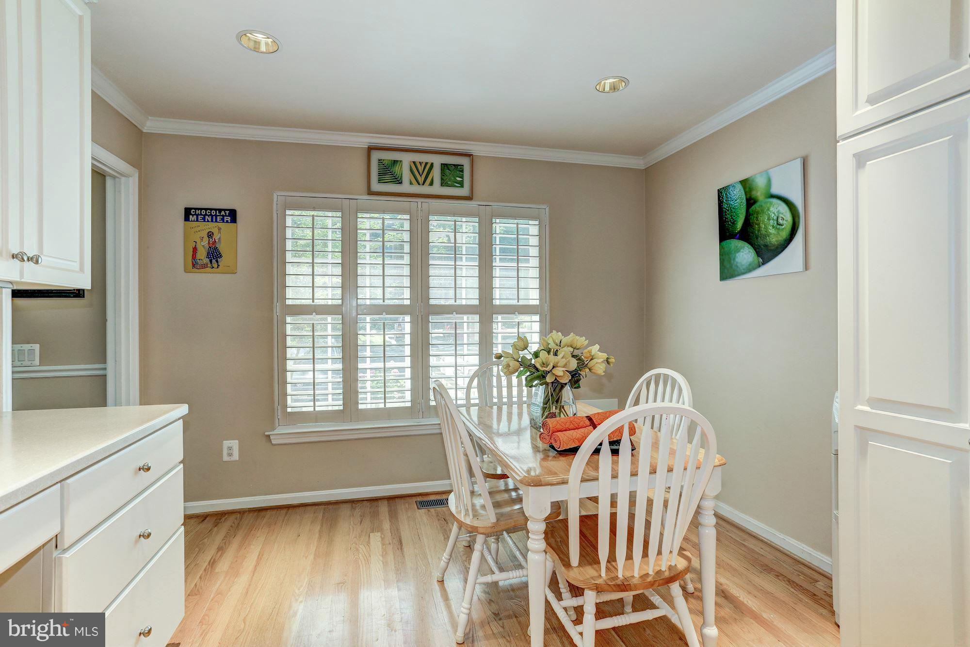 2109 Golf Course Drive Reston, VA 20191 - Photo 4 of 30 Breakfast room w/ hardwoods & plantation shutters