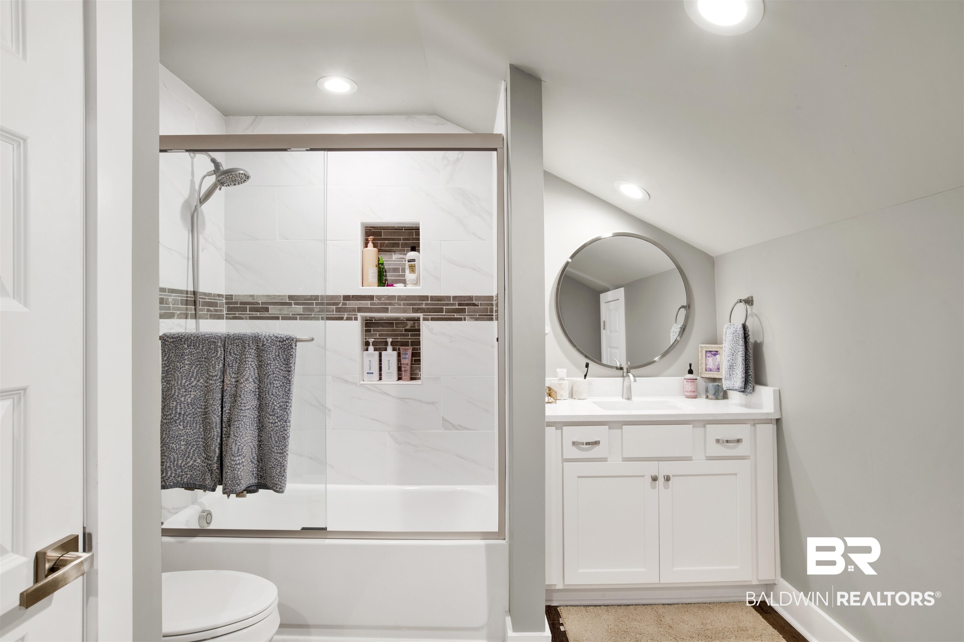 21621 Veranda Boulevard Fairhope, AL 36532 - Photo 7 of 51 Bathroom featuring vanity, toilet, recessed lighting, baseboards, and bath / shower combo with glass door
