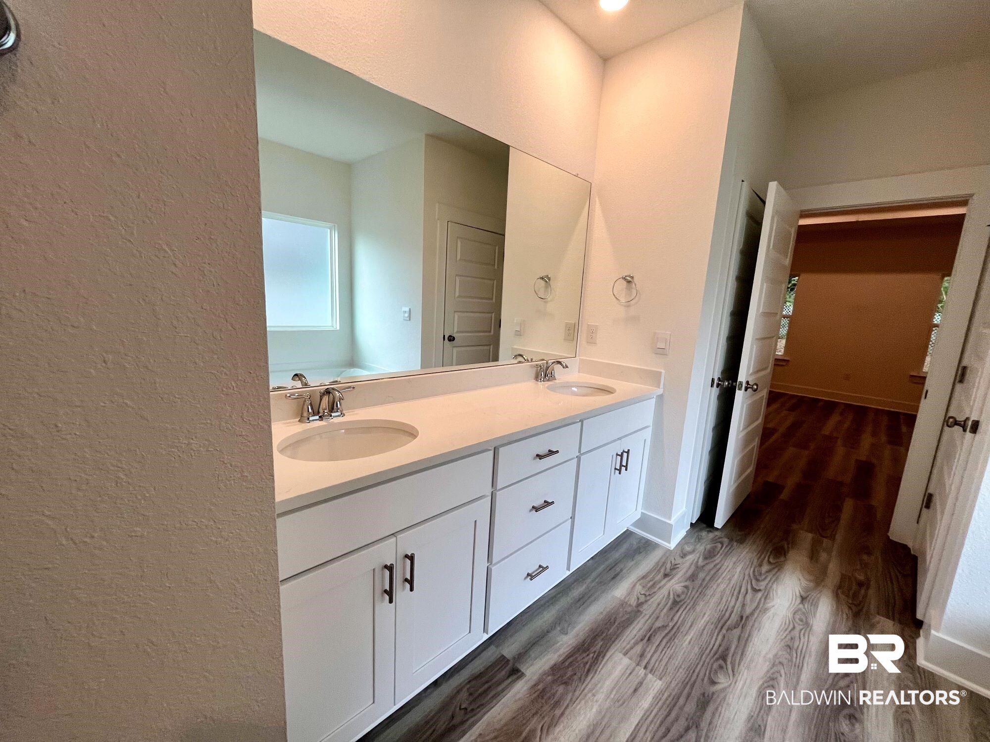 334 Barndling Street Fairhope, AL 36532 - Photo 28 of 34 Bathroom featuring wood-type flooring and vanity