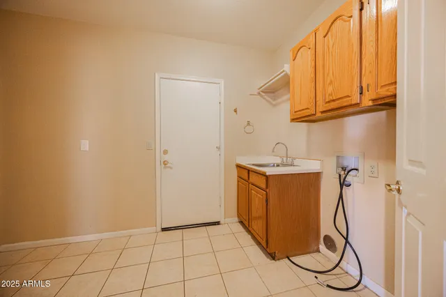 a view of a street with a garden