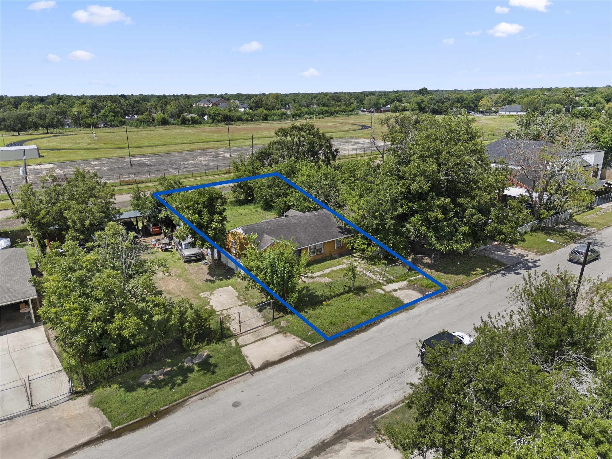 5238 Pershing Street Houston, TX 77033 - Photo 11 of 13 a view of a lake with a yard and potted plants