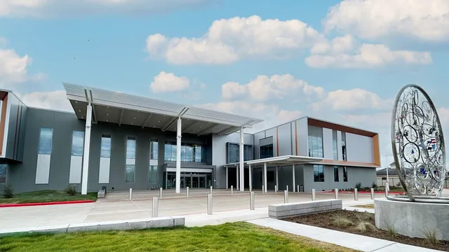 a view of a building with a swimming pool