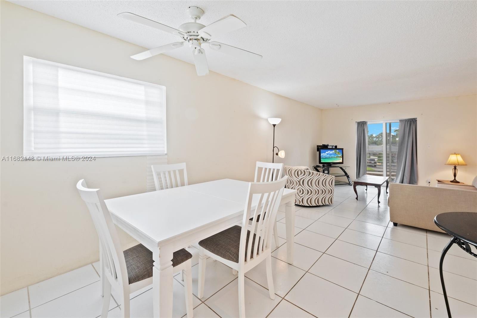 6501 Winfield Boulevard, Unit A31 Margate, FL 33063 - Photo 4 of 25 a view of a dining room with furniture