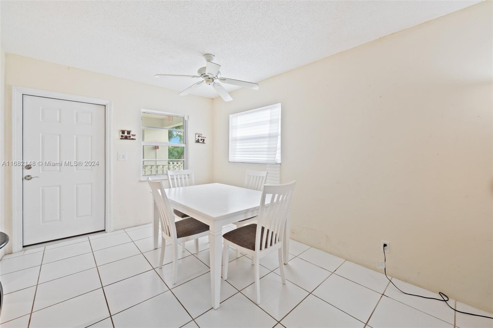 6501 Winfield Boulevard, Unit A31 Margate, FL 33063 - Photo 5 of 25 a view of a livingroom with furniture and window