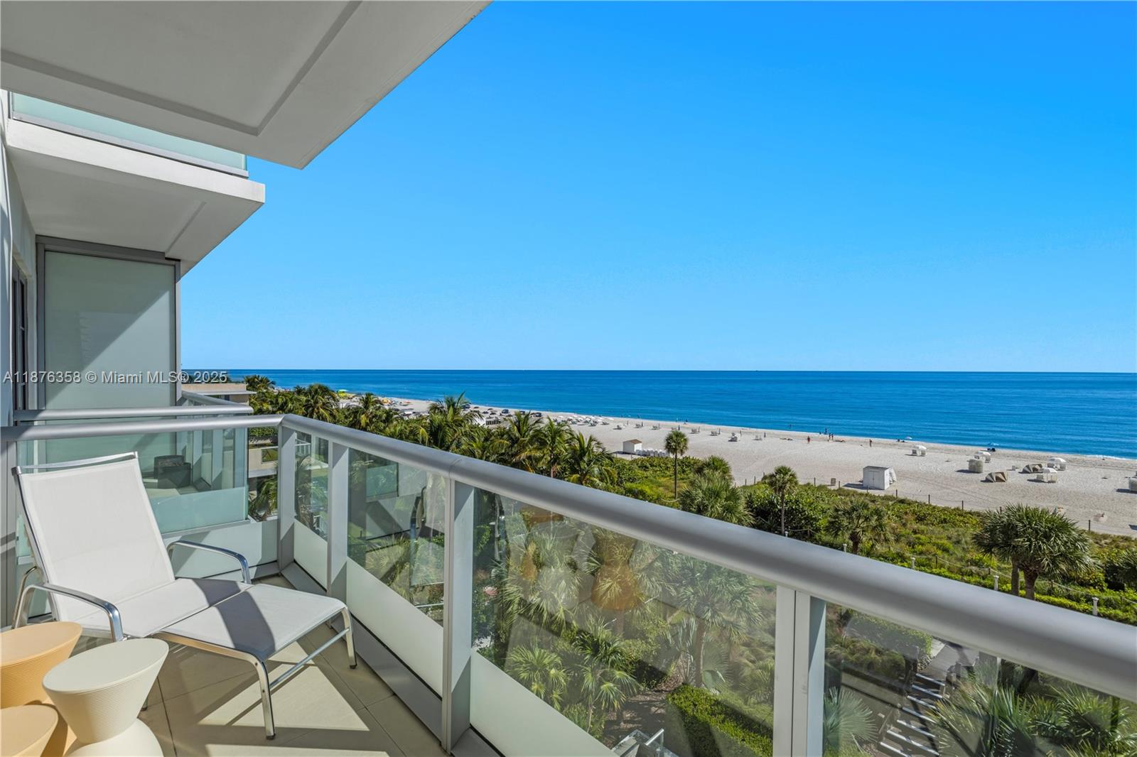 3739 Collins Avenue, Unit N501 Miami Beach, FL 33140 - Photo 7 of 19 a view of a balcony with wooden floor and outdoor space