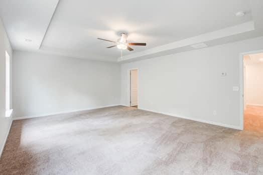 297 Whitetail Circle Canton, GA 30115 - Photo 17 of 35 an empty room with chandelier fan