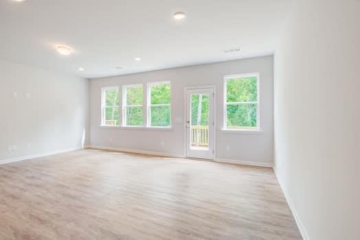297 Whitetail Circle Canton, GA 30115 - Photo 4 of 35 an empty room with windows