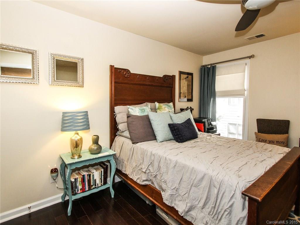318 Queens Road, Unit 5 Charlotte, NC 28204 - Photo 15 of 24 a bedroom with a bed and a window
