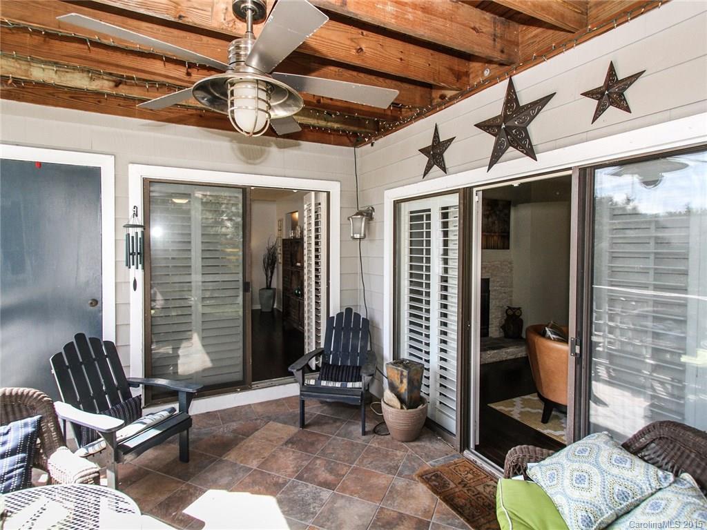 318 Queens Road, Unit 5 Charlotte, NC 28204 - Photo 19 of 24 a front view of a house with outdoor seating