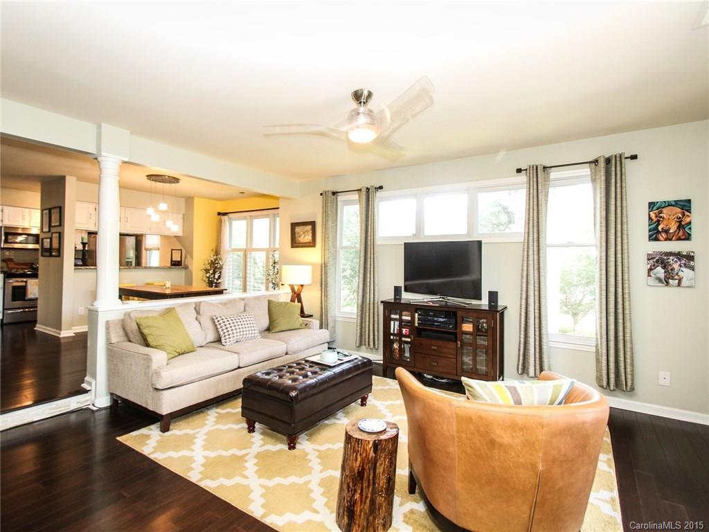 318 Queens Road, Unit 5 Charlotte, NC 28204 - Photo 3 of 24 a living room with furniture and a flat screen tv