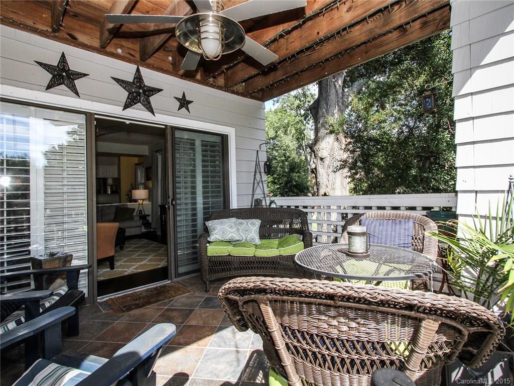 318 Queens Road, Unit 5 Charlotte, NC 28204 - Photo 21 of 24 a view of an outdoor sitting area with furniture and garden view