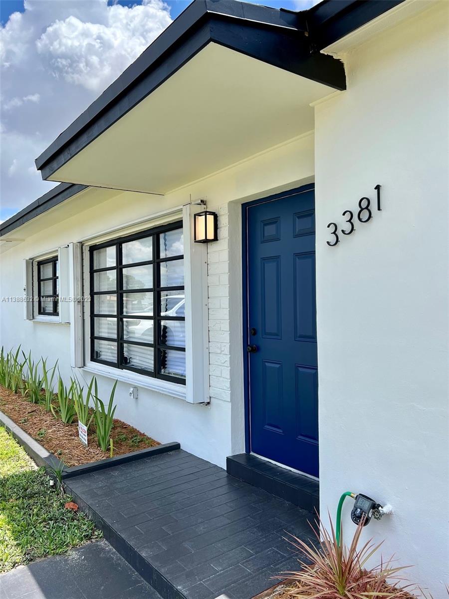 Westhaven Park Hialeah, FL 33012 - Photo 1 of 22 a front view of a house