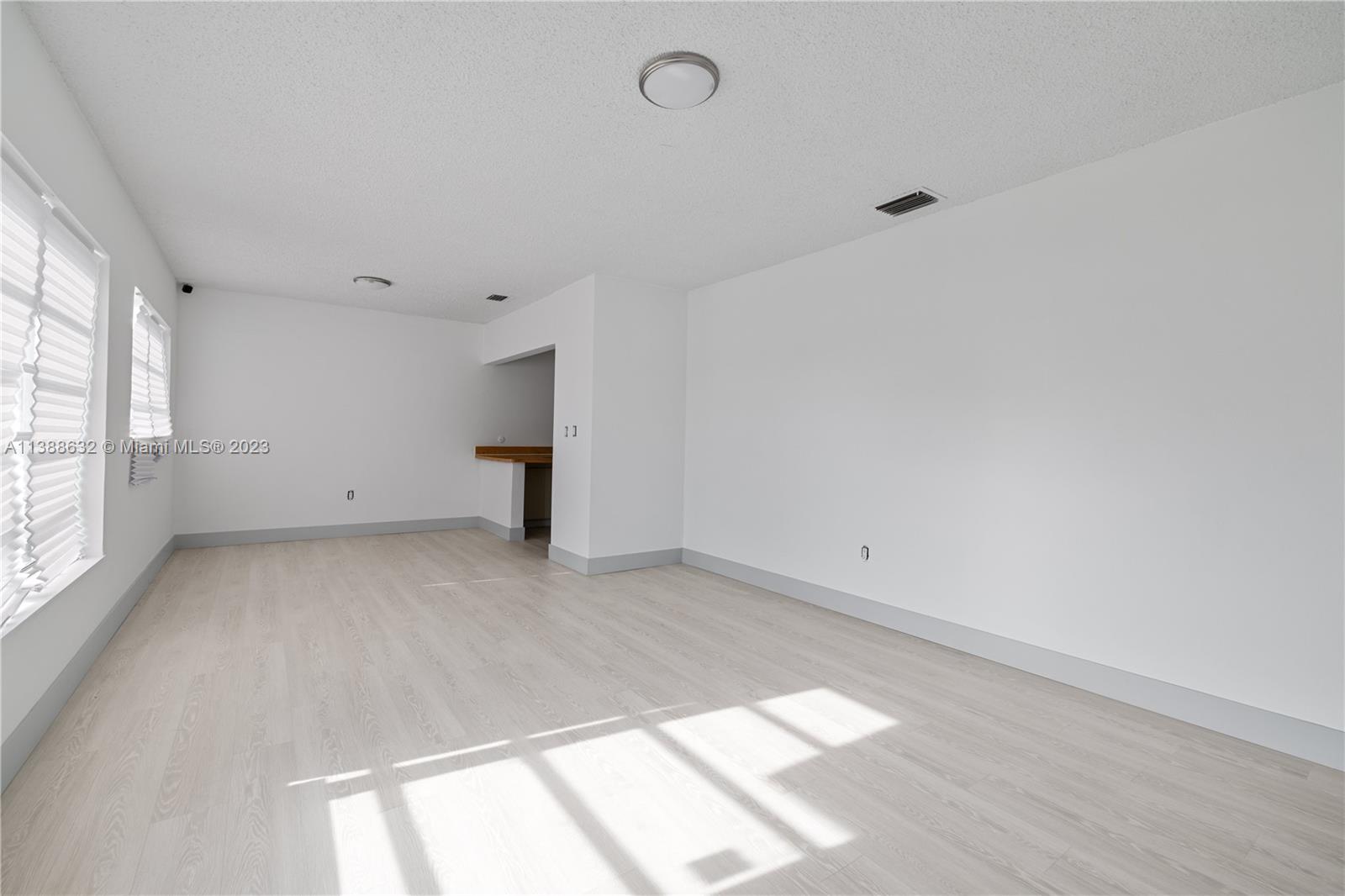 Westhaven Park Hialeah, FL 33012 - Photo 11 of 22 a view of empty room with window