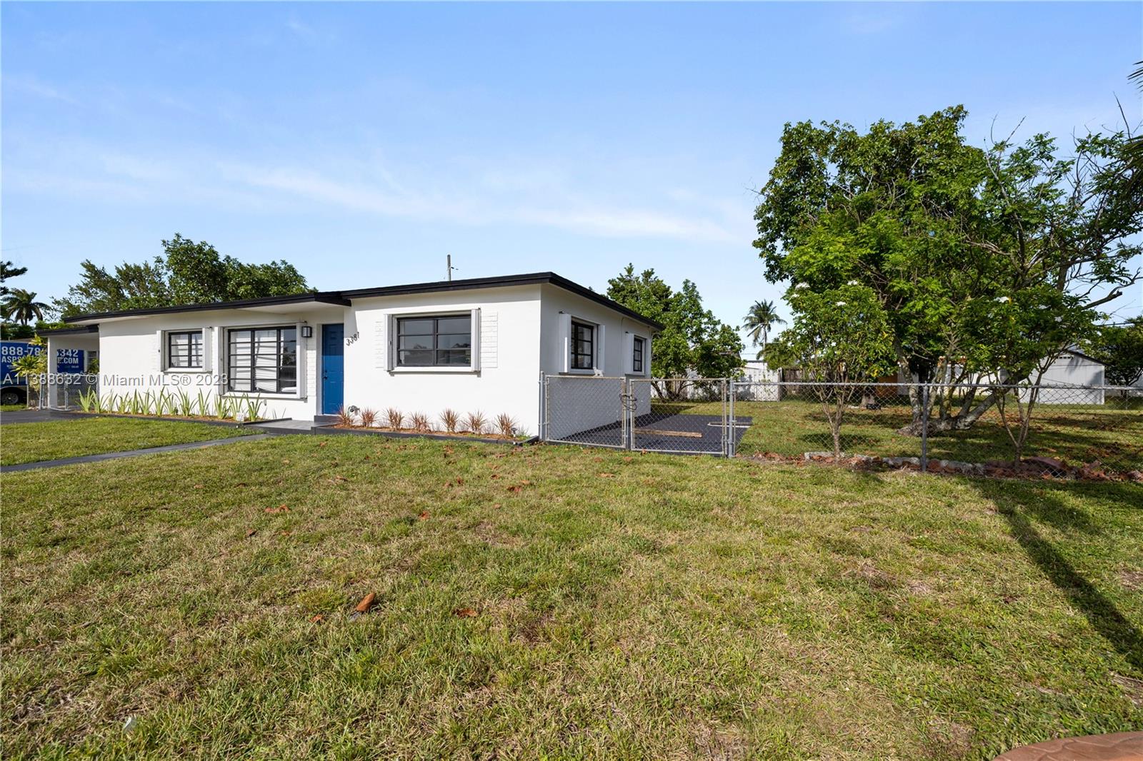 Westhaven Park Hialeah, FL 33012 - Photo 2 of 22 a house view with a garden space