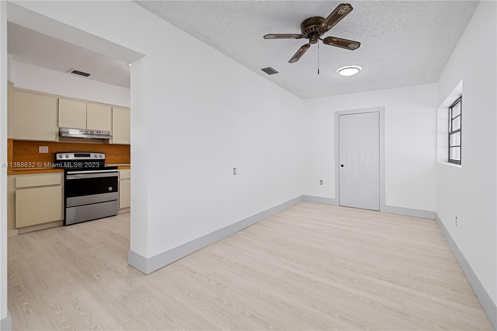 Westhaven Park Hialeah, FL 33012 - Photo 22 of 22 a view of cabinets and steel appliances