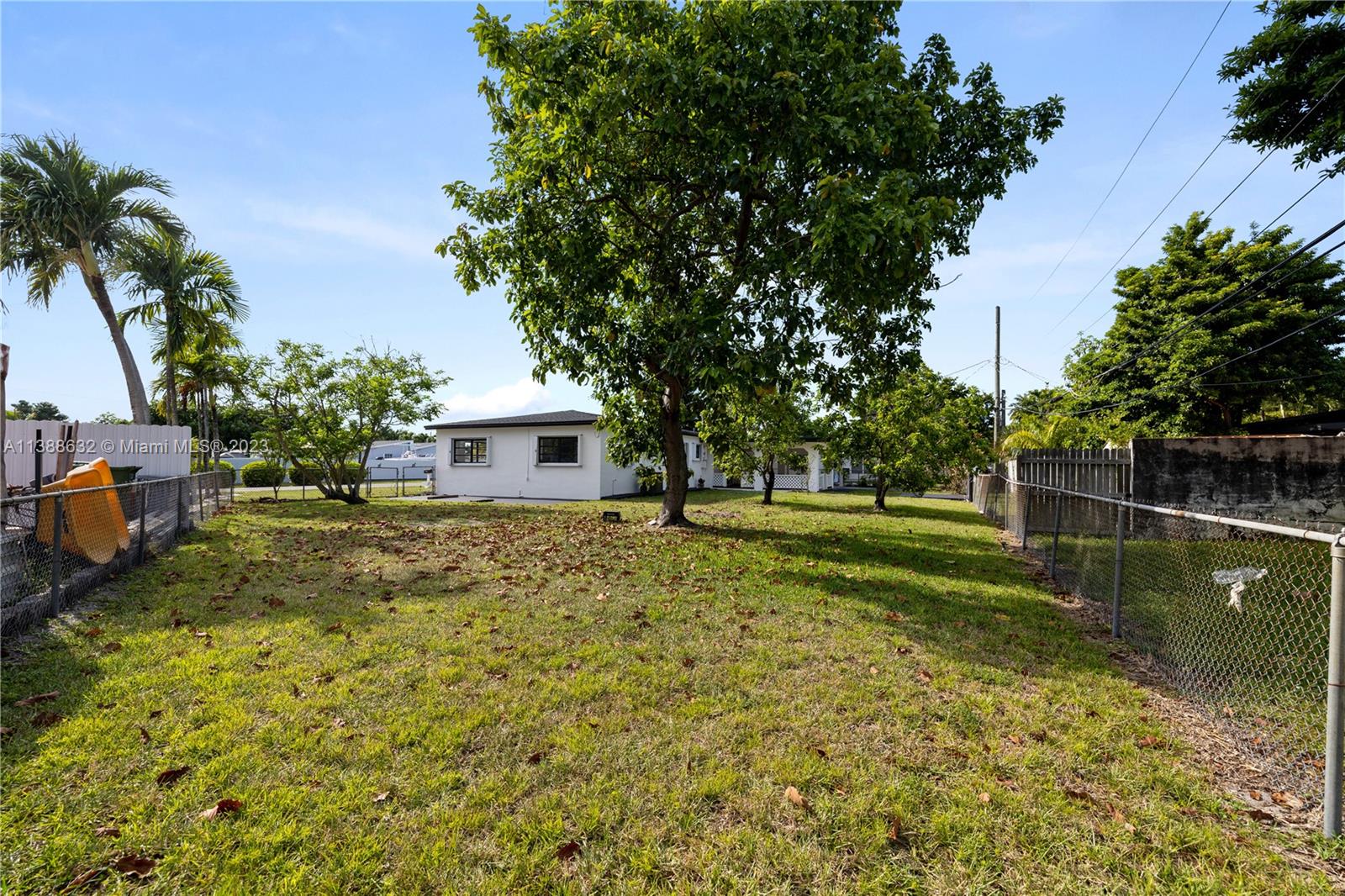 Westhaven Park Hialeah, FL 33012 - Photo 8 of 22 a view of a house with a yard