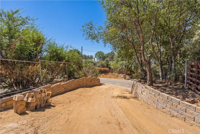 a view of snow on the road