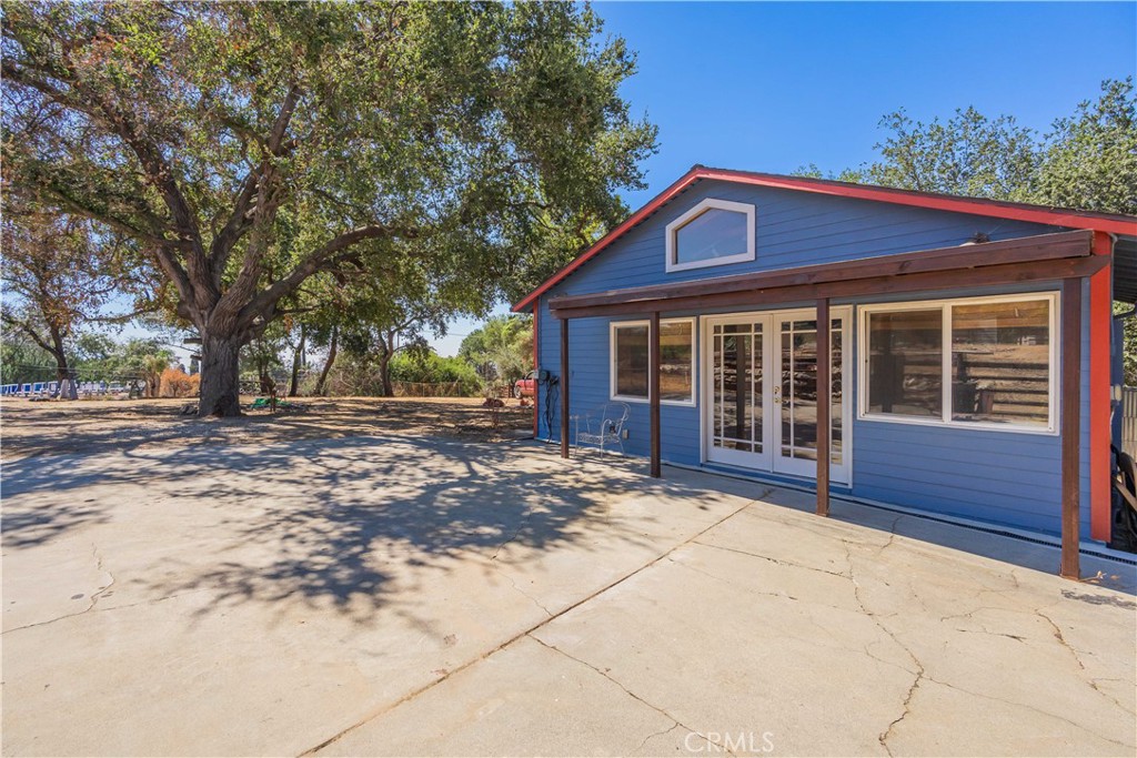 3430 Chaney Trail Altadena, CA 91001 - Photo 14 of 50 a view of house with backyard and trees in the background