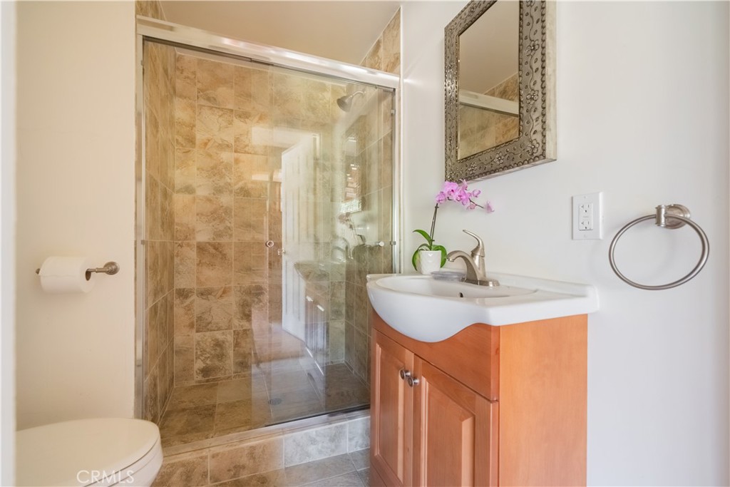 3430 Chaney Trail Altadena, CA 91001 - Photo 20 of 50 a bathroom with a sink and a mirror