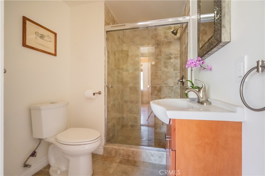 3430 Chaney Trail Altadena, CA 91001 - Photo 21 of 50 a bathroom with a sink a toilet and shower